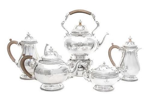 * A George V Five-Piece Silver Tea and Coffee Set, Crichton Brothers, London, 1913, comprising a teapot, coffee pot, kettle on l