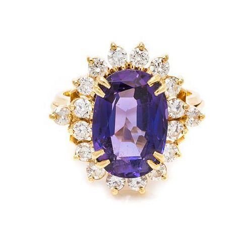 * An 18 Karat Yellow Gold, Purple Spinel and Diamond Ring, 5.50 dwts.