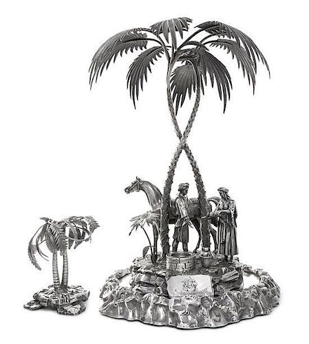 A Victorian Silver-Plate Figural Centerpiece, Elkington & Co., Birmingham, circa 1870, the rockwork base mounted with twisted pa