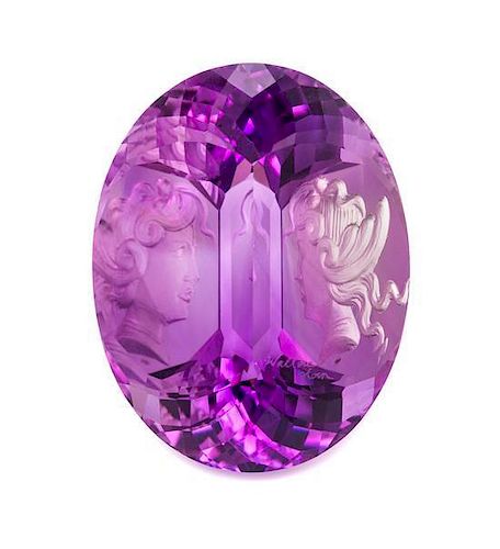 * A 37.00 Carat Oval Carved Reverse Intaglio Amethyst, Wallace Chan,