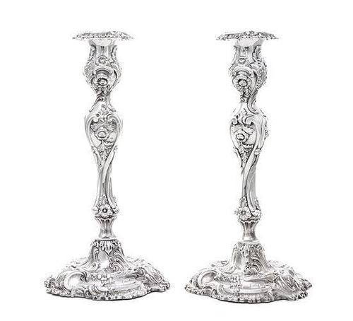 * A Pair of Victorian Silver Candlesticks, Henry Wilkinson & Co., Sheffield, 1855, on shaped circular bases with baluster stems,