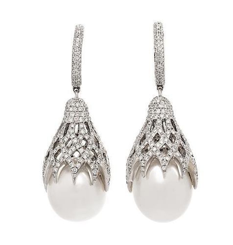 A Pair of 18 Karat White Gold, Cultured South Sea Pearl and Diamond Pendant Earrings, 15.80 dwts.