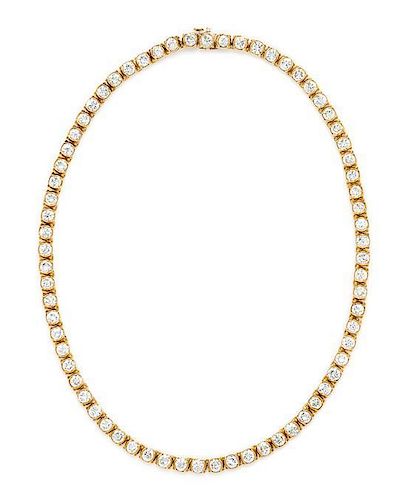 An 18 Karat Yellow Gold and Diamond Line Necklace, 21.00 dwts.