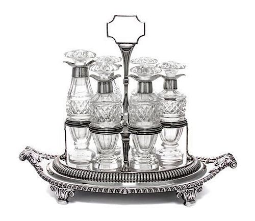 * Ormonde Service: A Regency Silver and Cut-Glass Cruet Set, Paul Storr, London, 1811, the stand oval with gadrooned borders and