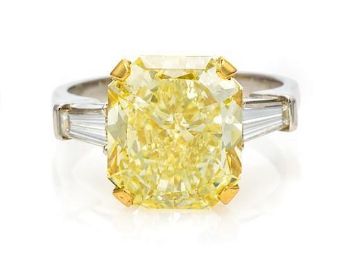 A Platinum, Yellow Gold, Fancy Yellow Diamond and Diamond Ring, Graff, 4.40 dwts.