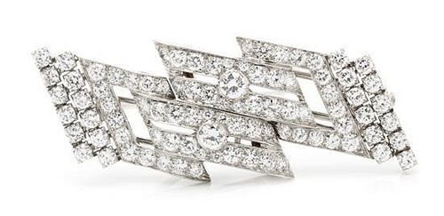 A Pair of Platinum and Diamond Dress Clips/Brooch, 12.00 dwts.