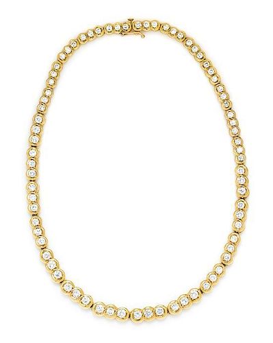 * A Graduated Yellow Gold and Diamond Necklace, 27.70 dwts.