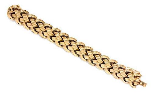 * A Yellow Gold Textured Link Bracelet, 46.60 dwts.
