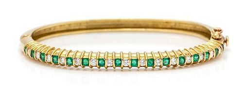 An 18 Karat Yellow Gold, Emerald, and Diamond Bangle Bracelet, J. Cooper, 14.20 dwts.