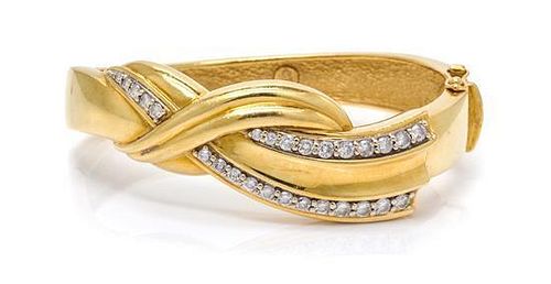 * An 18 Karat Yellow Gold and Diamond Bangle Bracelet, 36.60 dwts.
