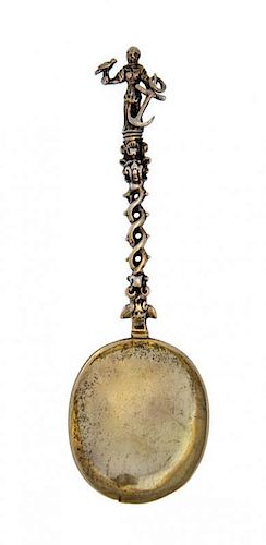 A Dutch Silver-Gilt Apostle Spoon, Maker's Mark WE, Circa 1715, the twisted handle with terminal formed as St. Clement, the reve