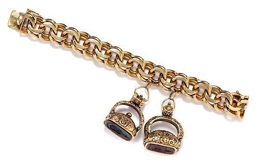 * A Yellow Gold Link Bracelet with Two Attached Hardstone Intaglio Fobs, 133.00 dwts.