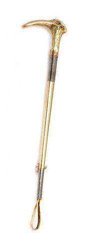 A Retro Yellow Gold and Platinum Riding Crop Pin, 2.90 dwts.