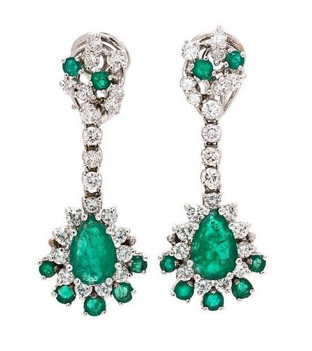 * A Pair of White Gold, Emerald and Diamond Pendant Earclips, 7.20 dwts.