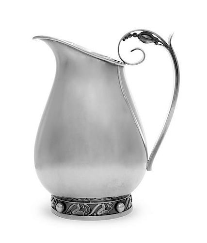An American Silver Water Pitcher, Alphonse LaPaglia for International Silver Co., Meriden, CT, Circa 1950, of baluster form, the