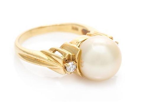 An 18 Karat Yellow Gold, Golden South Sea Pearl and Diamond Ring, 11.90 dwts.
