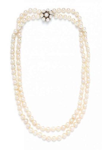 * A Double Strand Cultured Pearl Necklace with White Gold and Sapphire Clasp,