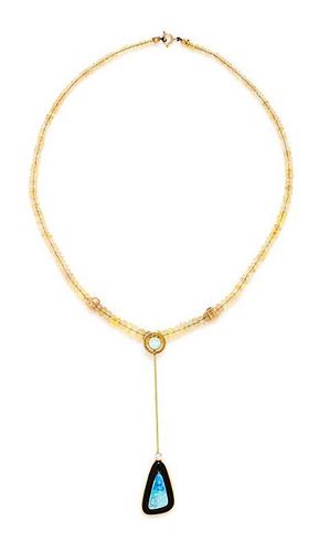 A 14 Karat Yellow Gold, Opal, Onyx and Diamond Lavalier Necklace, 7.90 dwts.