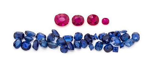 * A Collection of Unmounted Rubies and Sapphires,