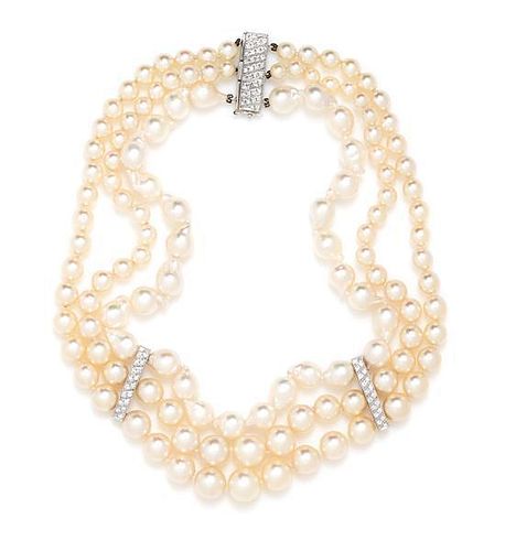 A White Gold, Diamond and Cultured Pearl Triple Strand Necklace,