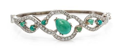 A White Gold, Turquoise and Diamond Bangle, 11.10 dwts.