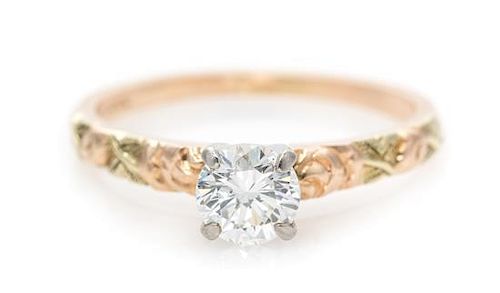 A 14 Rose Gold and Diamond Solitaire Ring, 1.40 dwts.