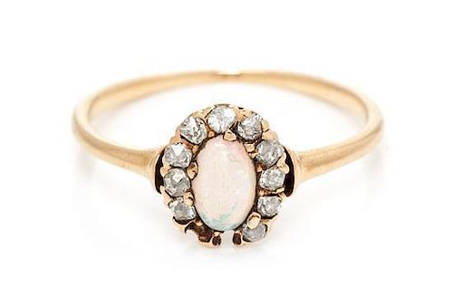 An Victorian Rose Gold, Opal and Diamond Ring, 0.90 dwts.