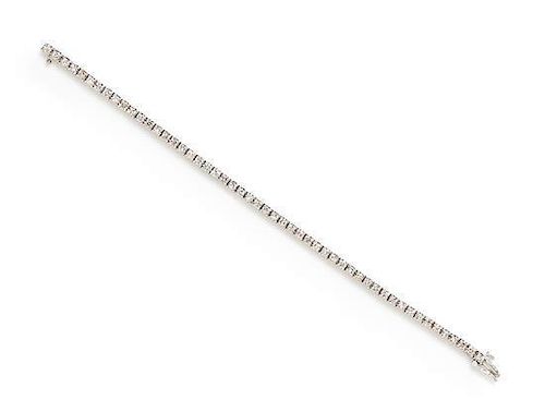 A 14 Karat White Gold and Diamond Line Bracelet, 9.20 dwts.