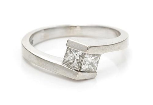 A 14 Karat White Gold and Diamond Ring, 1.50 dwts.