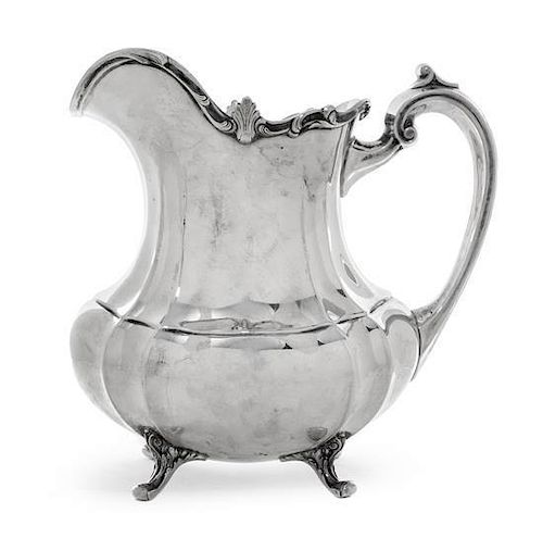 An American Silver Water Pitcher, Reed & Barton, Taunton, MA, 1951, Hampton Court pattern, of panelled oval baluster form, the r