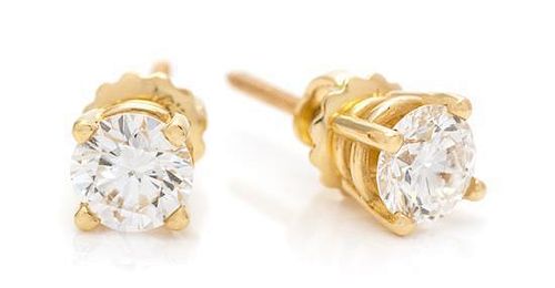 A Pair of Yellow Gold and Diamond Stud Earrings, 1.00 dwts.
