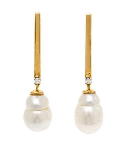 * A Collection of 18 Karat Yellow Gold, Cultured Baroque Pearl and Diamond Earrings, 10.60 dwts.