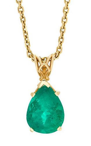 A Yellow Gold and Emerald Pendant, 4.40 dwts.