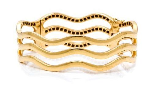 * An 18 Karat Yellow Gold Bangle Bracelet, Gübelin, 43.10 dwts.