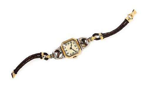 * An 18 Karat Yellow Gold, Platinum and Horse Motif Essex Crystal Wristwatch, Henry Blank & Co. for C.H. Meylan,