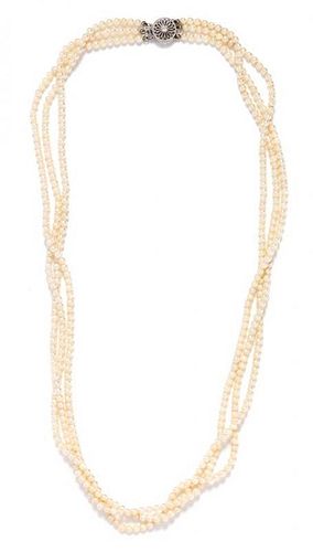 A Triple Strand Cultured Pearl Necklace,