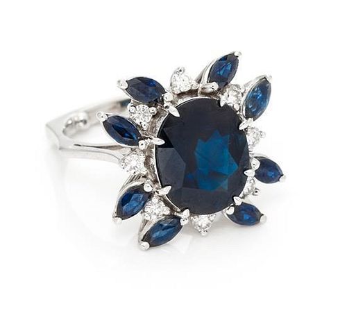 * A White Gold, Sapphire and Diamond Ring, 4.90 dwts.