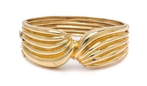 A 14 Karat Yellow Gold Bangle Bracelet, 30.30 dwts.