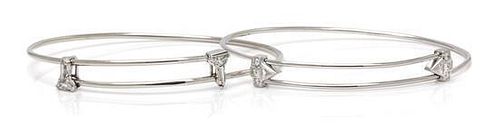 A Collection of White Gold, Platinum and Diamond Bangle Bracelets, 8.90 dwts.