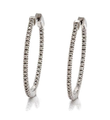 A Pair of 18 Karat White Gold Diamond Hoop Earrings, 4.00 dwts.
