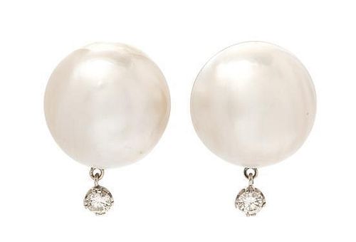 A Pair of White Gold, Mabe Pearl and Diamond Earclips, 8.90 dwts.