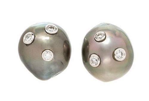 A Pair of White Gold, Cultured Tahitian Pearl and Diamond Earclips, 7.00 dwts.