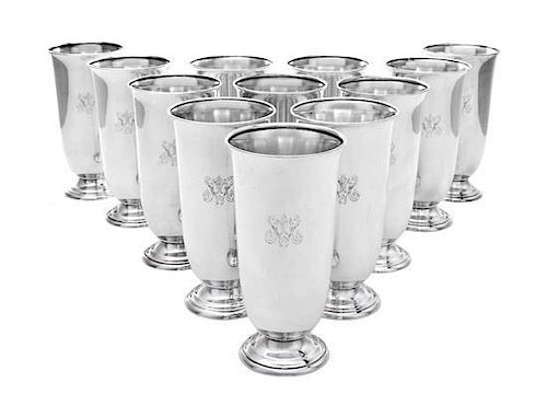 * A Set of Twelve American Silver Beakers, Meriden Brittania Co., Meriden, CT, Mid 20th Century, tulip form with slightly flared