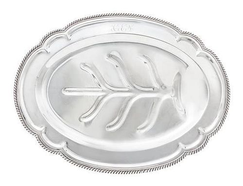 * An American Silver Well-and-Tree Platter, Black, Starr & Gorham, New York, NY, Circa 1930, shaped oval with gadrooned border,