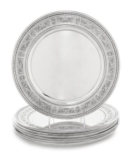 * A Set of Seven American Silver Chargers, International Silver Co., Meriden, CT, Circa 1925, Wedgwood pattern, the borders deco
