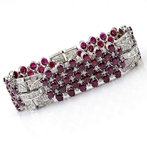 Van Cleef & Arpels style approx. 51.0 Carat Oval Cut Ruby, 7.0 Carat Baguette and Pave Set Diamond and 18 Karat White Gold Bracelet.