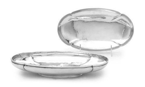 A Pair of American Silver Celery Dishes, The Kalo Shop, Chicago, IL, 1929-32, the shallow oval bowls with lobed sides, raised on