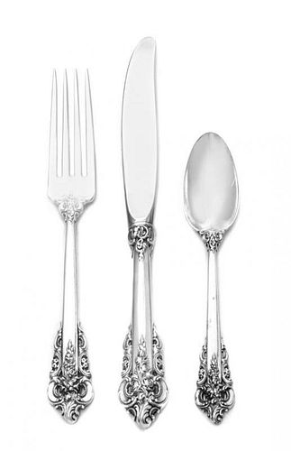 * An American Silver Flatware Service, Wallace Silversmiths, Wallingford, CT, Grand Baroque pattern, comprising 12 dinner knives