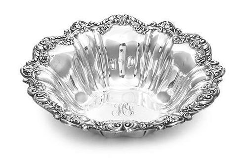 An American Silver Bowl, Gorham Mfg. Co., Providence, RI, 1906, shaped circular with partly lobed sides, the border applied with