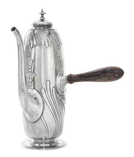 An American Silver Coffee Pot, Dominick & Haff, New York, NY, 1892, of ovoid form, chased with sweeping lobes and bellflower pen